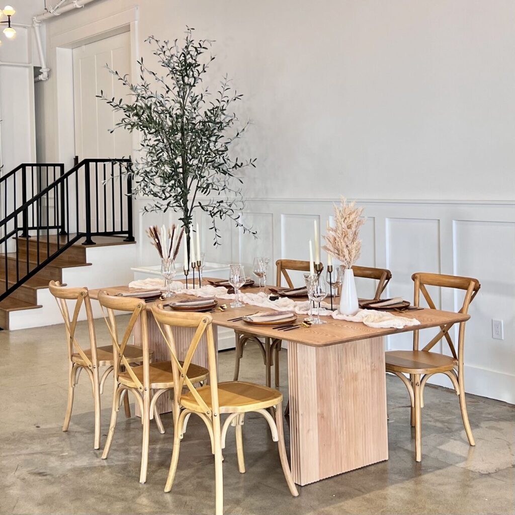 Dining setup — Carlsbad Table, Cross Back Vineyard Chair | Vogue Rentals