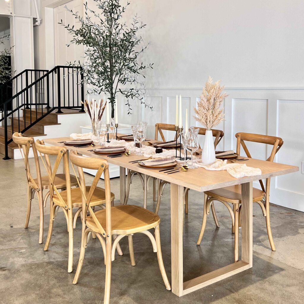 Dining setup — MANHATTAN TABLE, Cross Back Vineyard Chair | Vogue Rentals