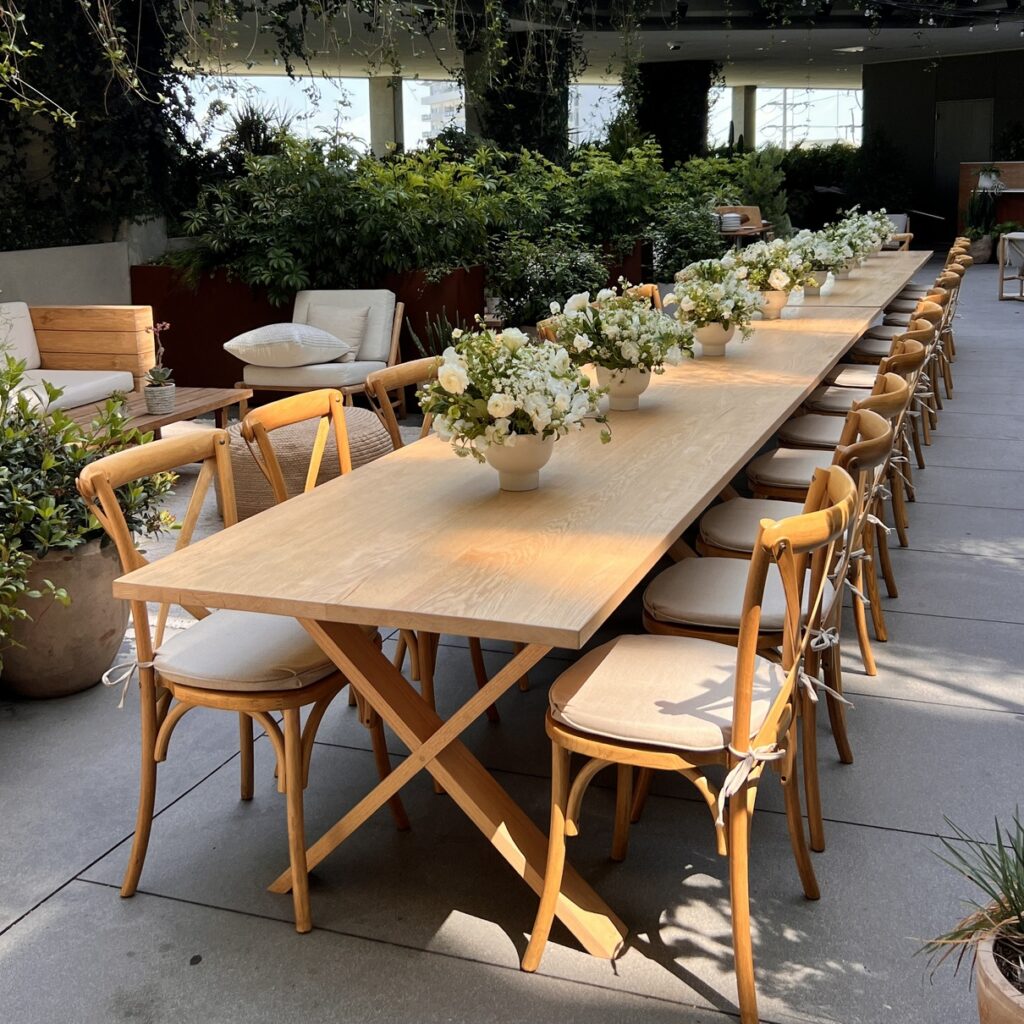 Dining setup — Temecula X-Frame Table, Cross Back Vineyard Chair | Vogue Rentals
