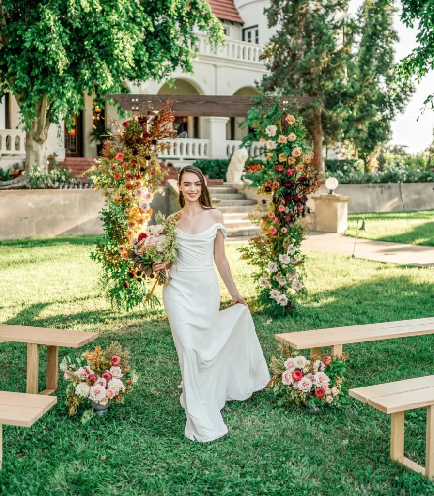 Wedding setup — Timber Chuppah Arch, Santa Monica Bench | Vogue Rentals