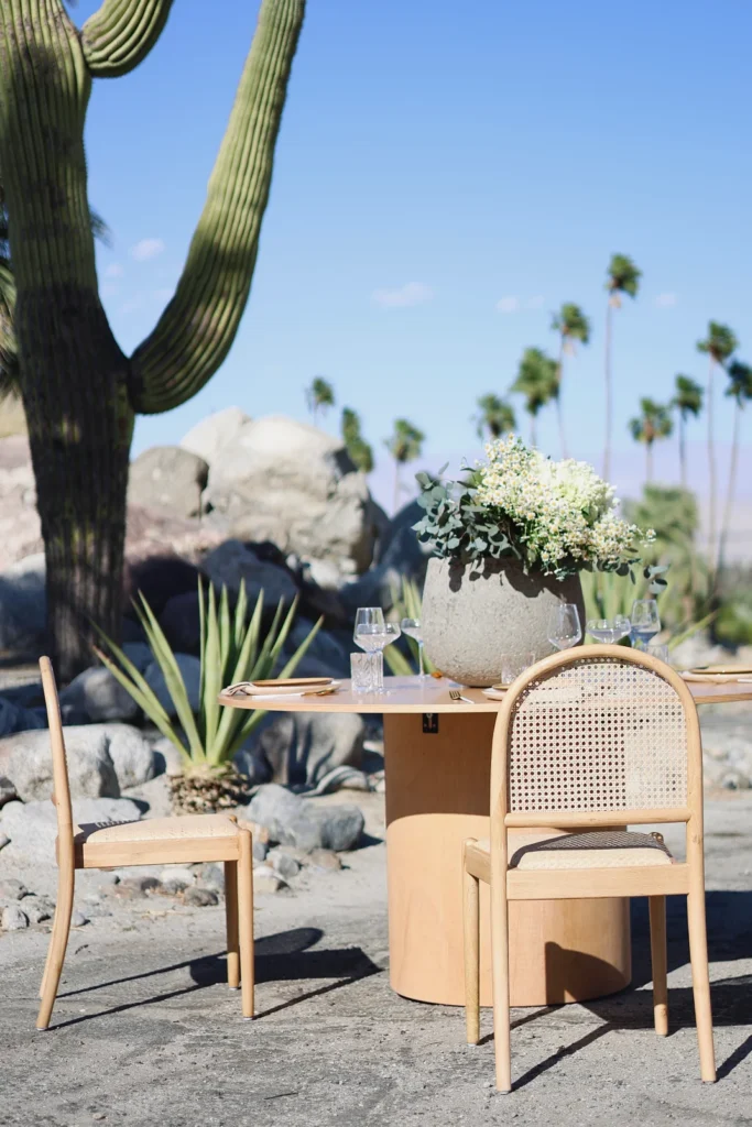 Dining setup — Katmai Round Table, Modern Weaver Chair | Vogue Rentals