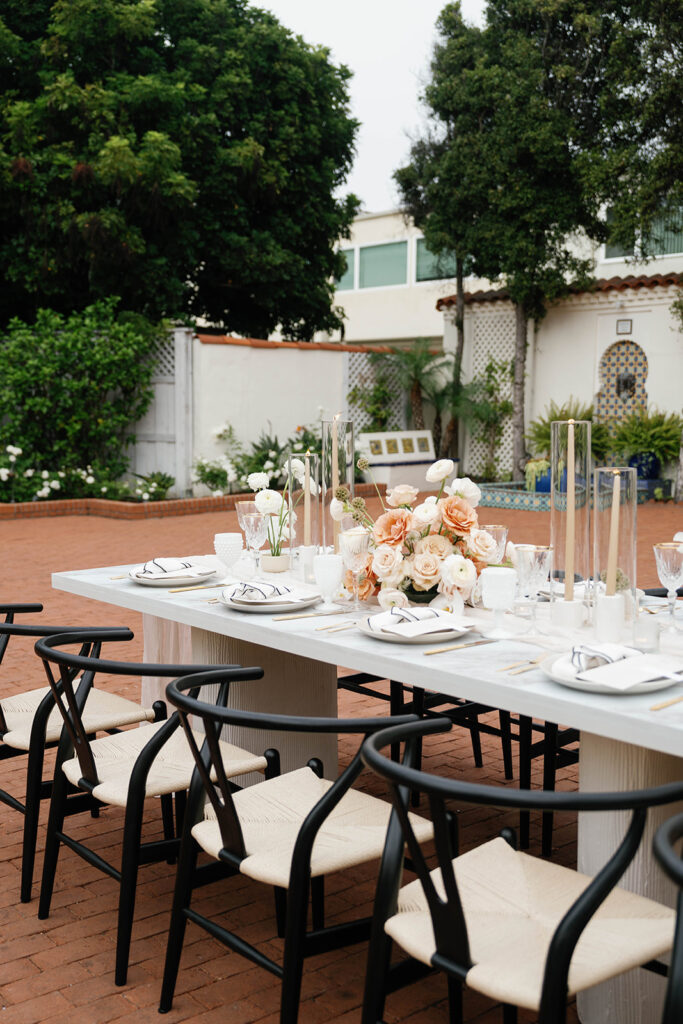 Dining setup — Flute Marble Table, Black Y Style Modern Chair | Vogue Rentals