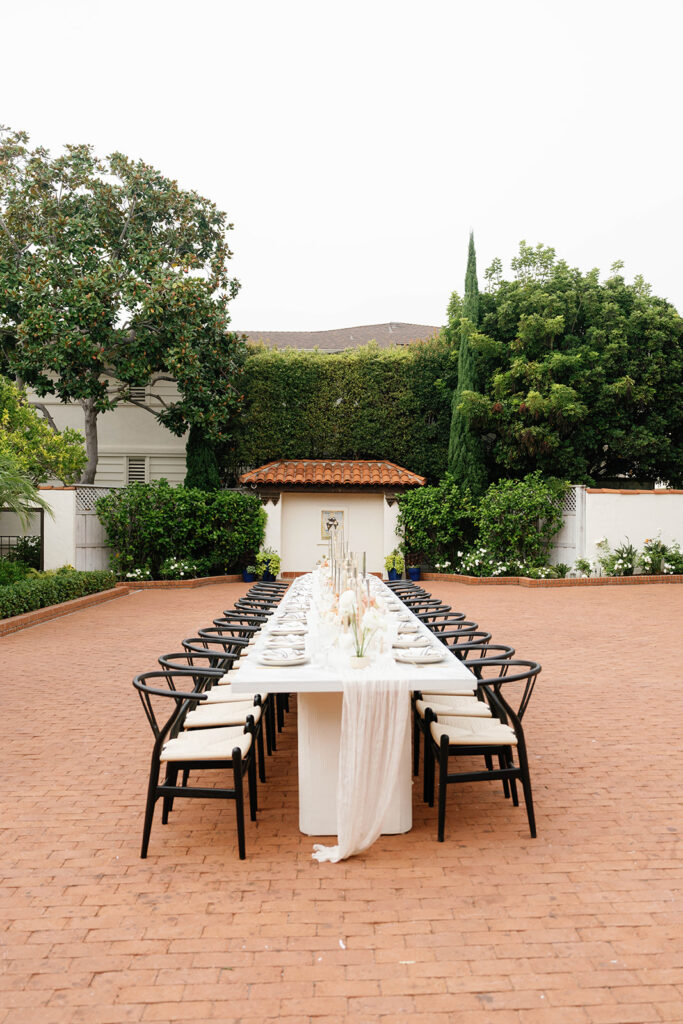 Dining setup — Flute Marble Table, Black Y Style Modern Chair | Vogue Rentals